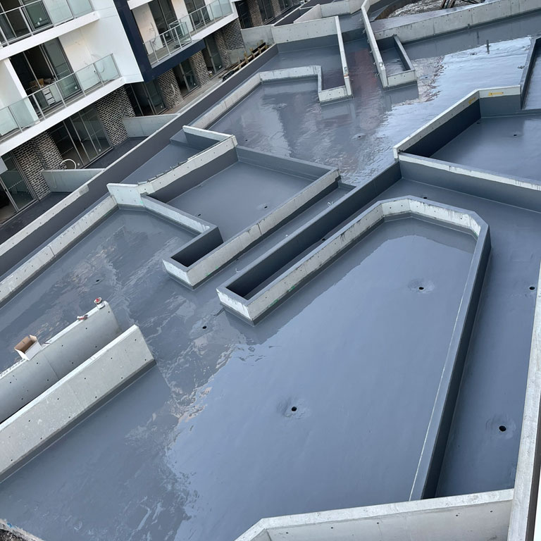 Floor waterproofing membrane on a concrete slab